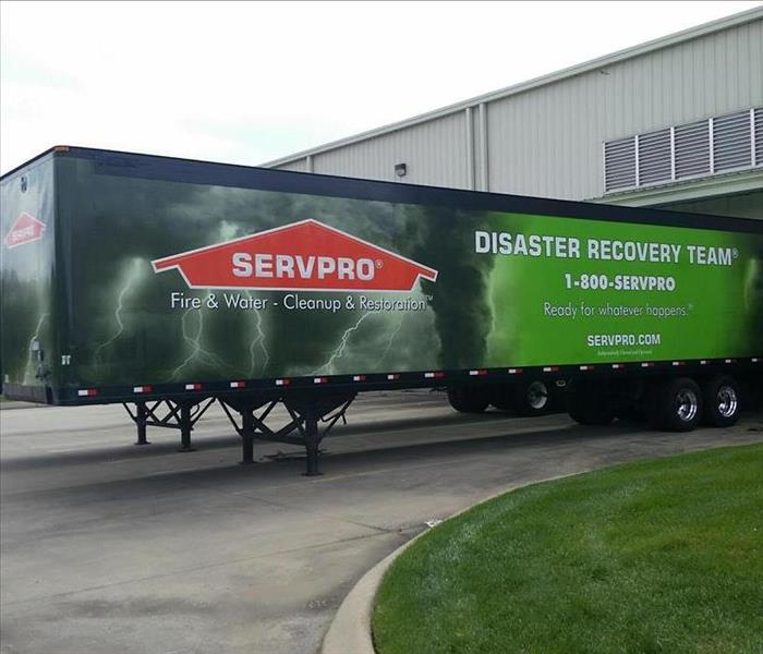 SERVPRO Large trailer backed up to a dock. 